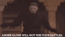 a picture of a man with the words anger alone will not win your battles below it