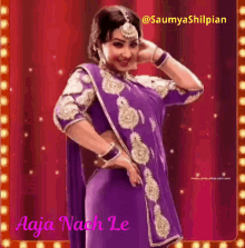 a picture of a woman in a purple dress with the words aaja nach le on it