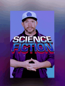 a man wearing a hat and a purple shirt stands in front of a science fiction poster