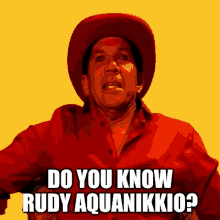 a man wearing a red shirt and a red hat is asking do you know rudy aquanikkio