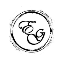 a black and white logo with the letters e and g in a circle .