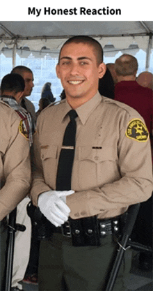 a police officer stands in front of a crowd with the words my honest reaction below him