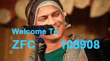 a man singing into a microphone with the words welcome to zfc 109904 written below him