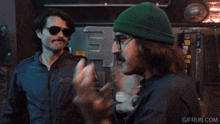 a gif from gifrun.com shows two men in military uniforms