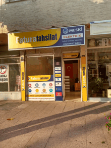 a building with a sign that says fatura tahsilat on it