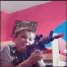 a blurry picture of a person holding a gun