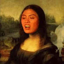 a woman is making a funny face in front of a painting of a woman .