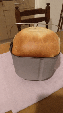 a loaf of bread is sitting in a bread maker