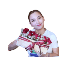 a woman holding two wooden boxes with flowers on them