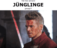 a picture of a man with blood on his face and the words junglinge