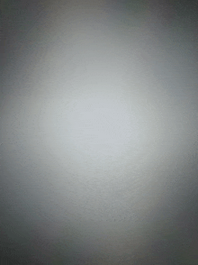 a white background with a gray gradient in the middle