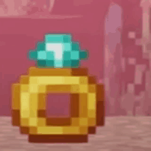 a pixel art of a ring with a diamond on top .