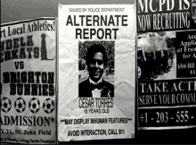 several posters on a wall including one that says " alternate report "