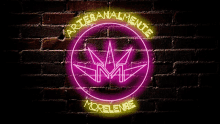 a neon sign that says artesanalmente morelense