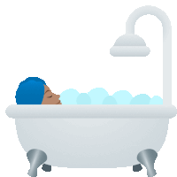 a woman is taking a bath in a bathtub