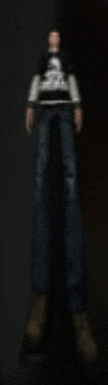 a blurred image of a person standing in a dark room