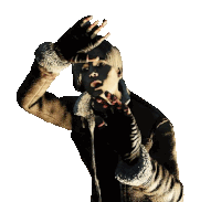 a person covering their face with their hands in a dark room