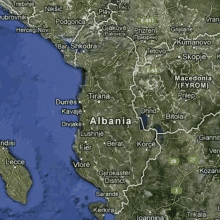 a map of albania shows a large body of water surrounded by mountains