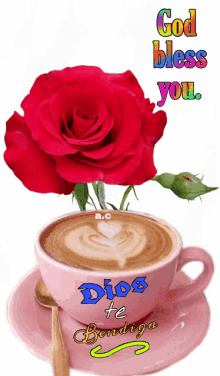 a cup of coffee with a red rose and the words god bless you on it