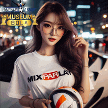 a girl wearing glasses and a white shirt that says mix parlay holds a soccer ball