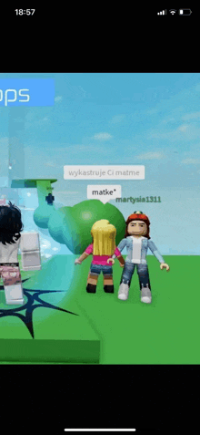 a girl in a video game is standing next to a large green object that says " matka "