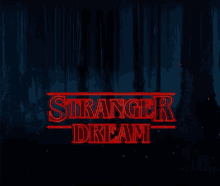 a poster for stranger dream with a dark forest background