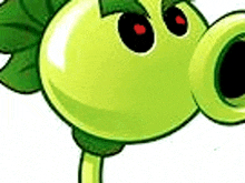 a close up of a green cartoon character with red eyes and a leaf on its head .