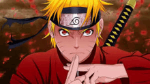 naruto is wearing a headband and holding a sword in his hands .