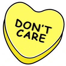 a yellow heart shaped candy that says don 't care