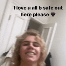 a blurry picture of a person with the words " i love u all b safe out here please " on it