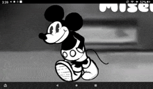 a black and white drawing of mickey mouse is on a phone screen .