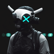 a person wearing a gas mask with a blue x on it