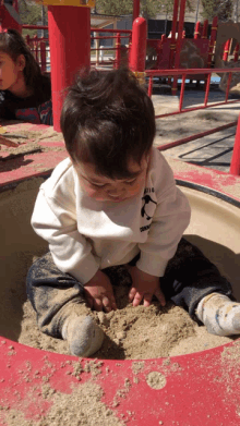 a little boy wearing a shirt that says ' chicago ' on it