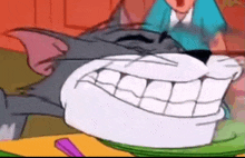 a close up of a cartoon character 's face with a big smile on it .