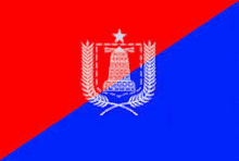 a red and blue flag with a tower and wheat ears on it .