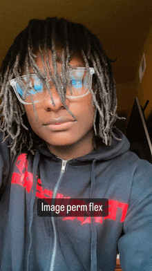 a person wearing glasses and a black hoodie with the words image perm flex on it