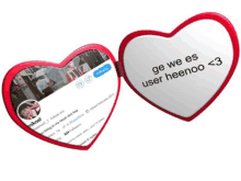 a heart shaped mirror with the words " ge we es user heenoo < 3 " on it