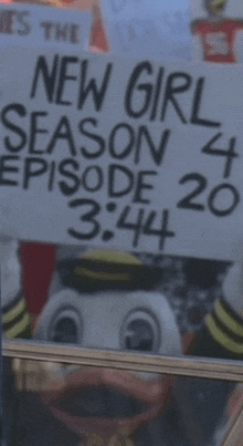 a sign that says " new girl season 4 episode 20 3:44 "