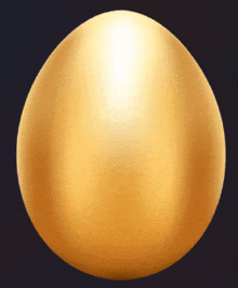 a golden egg against a black background with a glowing center