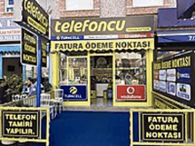 a store front with a sign that says telefoncu fatura ödeme noktasi