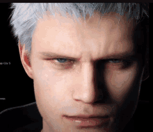 a close up of a man 's face with devil may cry 5 written on the bottom right