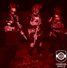 three soldiers standing next to each other with a crimson shield logo in the corner