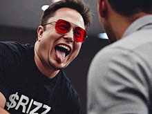 a man wearing sunglasses and a shirt that says $riz7 is sticking out his tongue