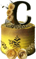 a yellow cake with flowers and a letter c on top