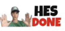 a blurry picture of a man with his hands up in front of the words `` hes done '' .