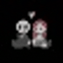 a blurry picture of two cartoon characters standing next to each other on a black background .