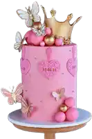 a pink cake with a gold crown and butterflies