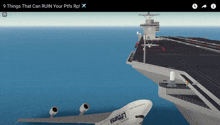 a lufthansa plane is sitting next to a large ship