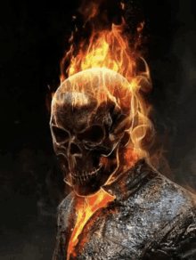 a ghost rider is surrounded by flames and smoke