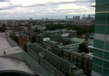 an aerial view of a city with a building that says ' telegraph ' on the top